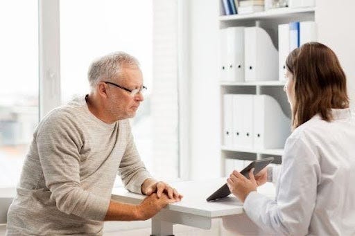 patient and doctor talking