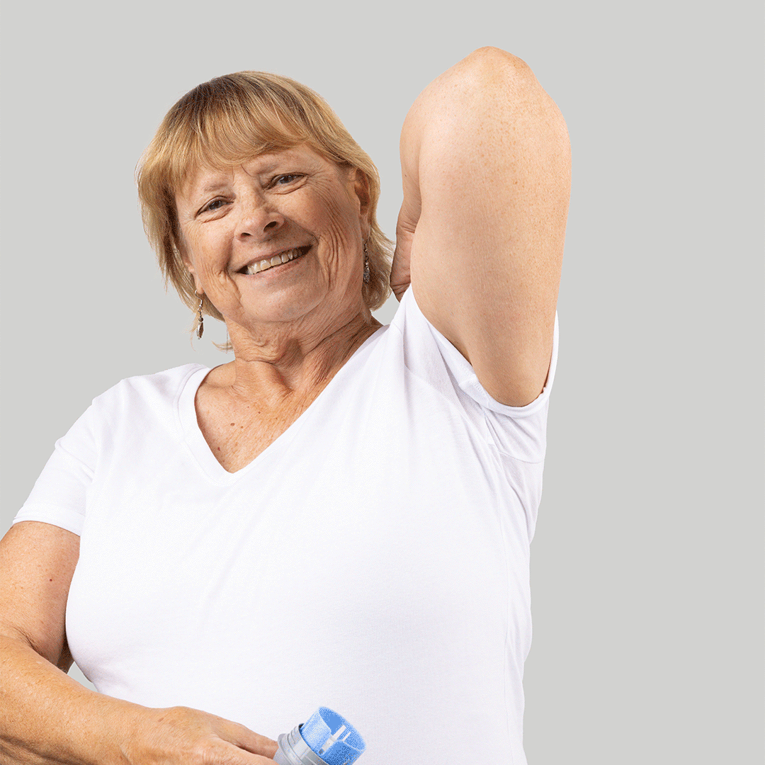 Woman applying Freestyle Libre System CGM